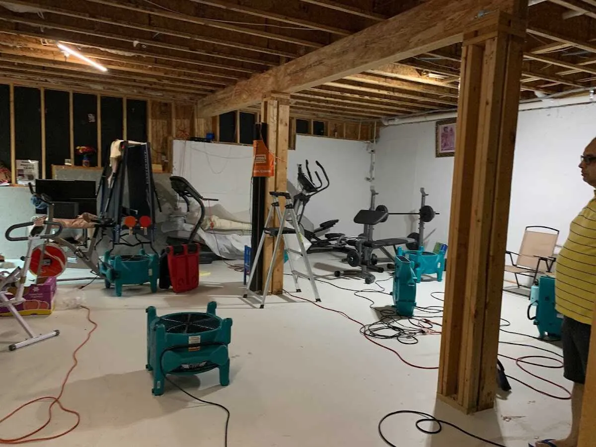 Basement drying equipment setup for Contents Cleaning & Restoration in Escanaba
