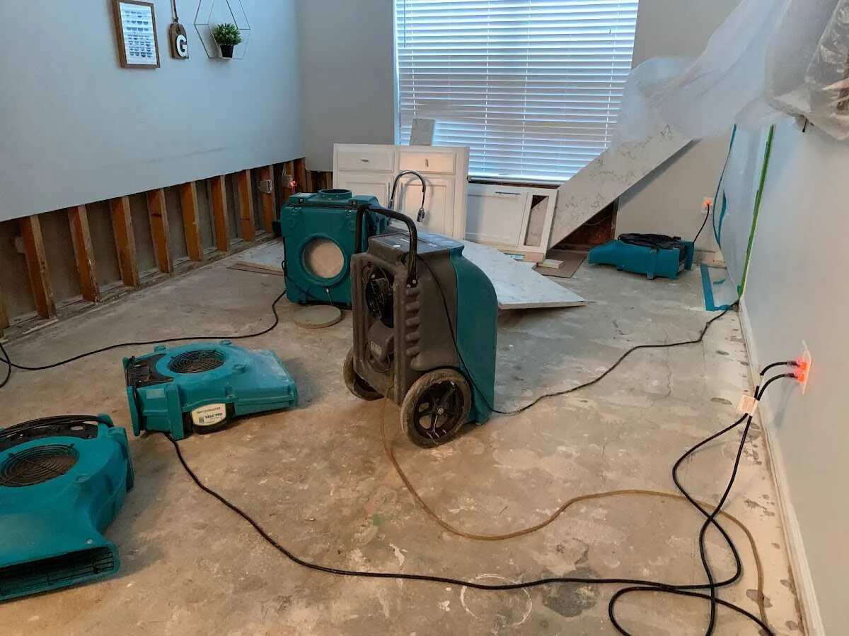 Dehumidifier in flood-cut room for Water Damage Restoration in Escanaba